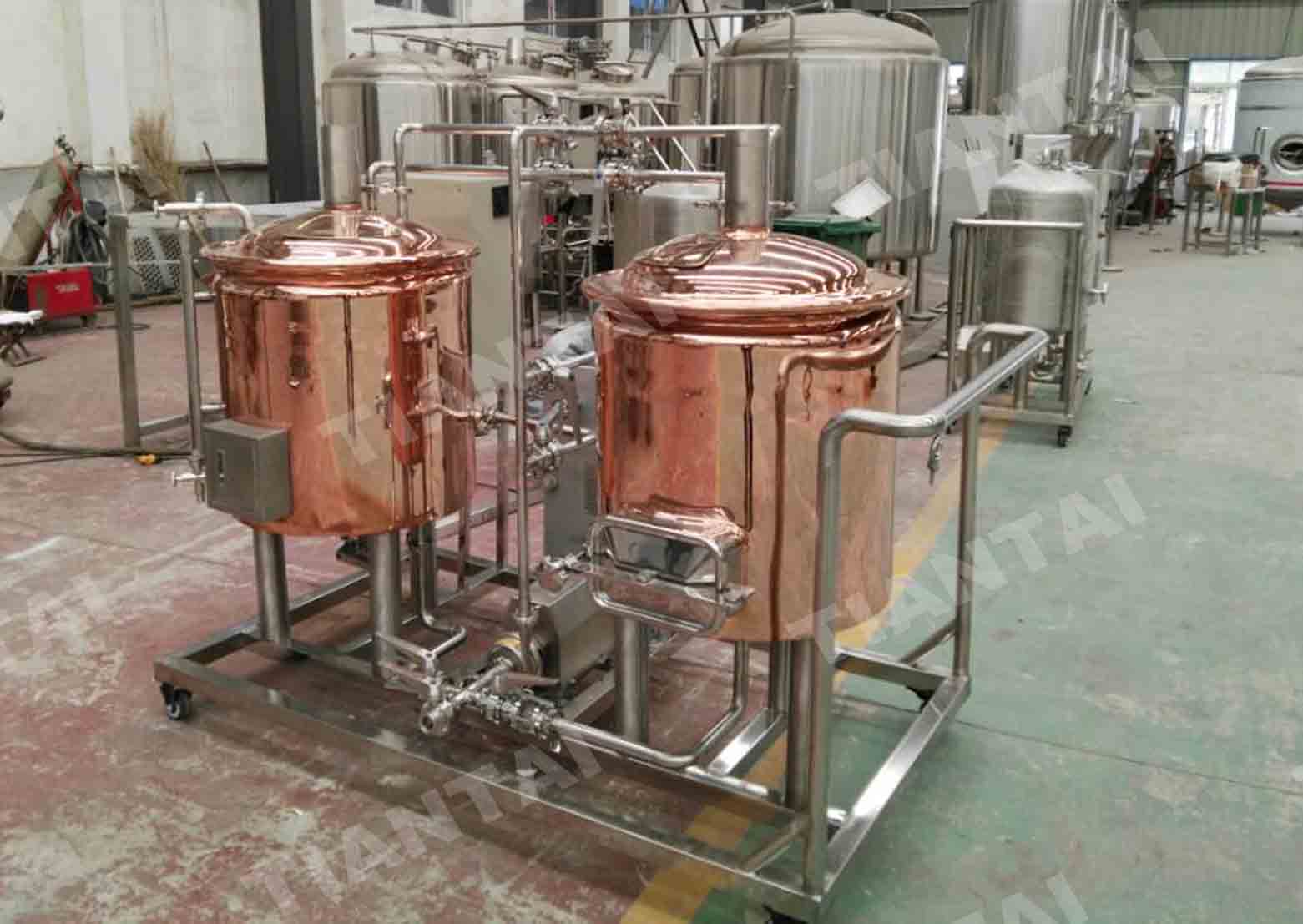 Small batch luxury red copper beer brewing tanks before